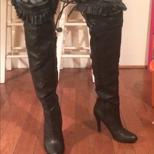 Black leather knee high boots